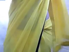 Busty lady is touching her tits in front of a web camera, just for fun